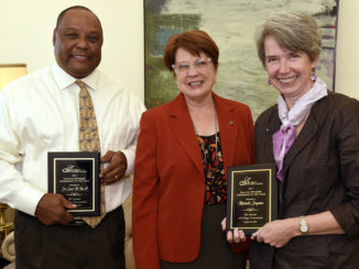 Dr. Maureen Murphy, center, recognized Associate Professor Dr. Cicero Fain III, left, and Professor Michelle Simpson